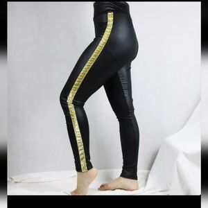 NWOT Black Vegan/Faux leather pants with gold trim. Size L/XL.